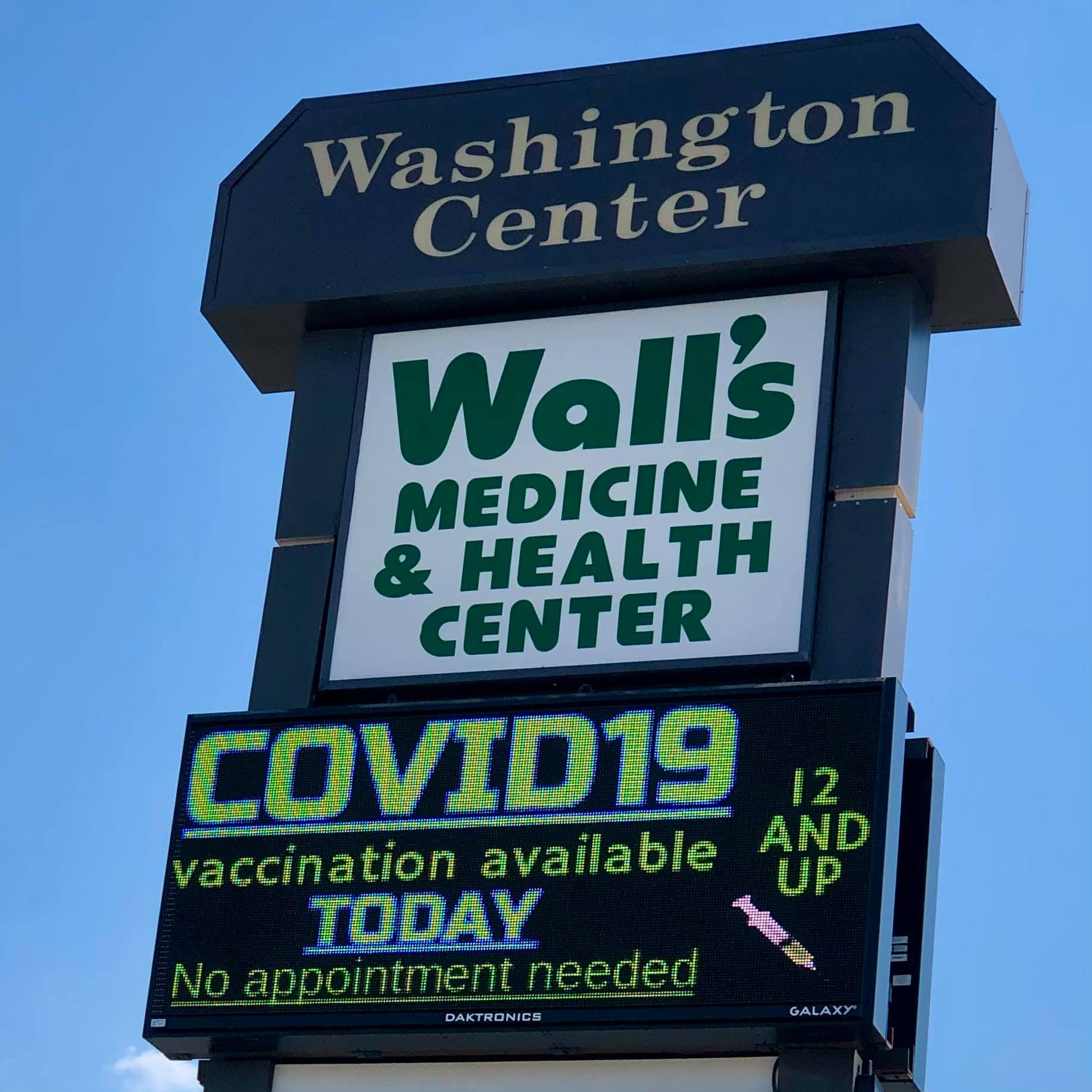 A sign for Wall’s Medicine & Health Center,