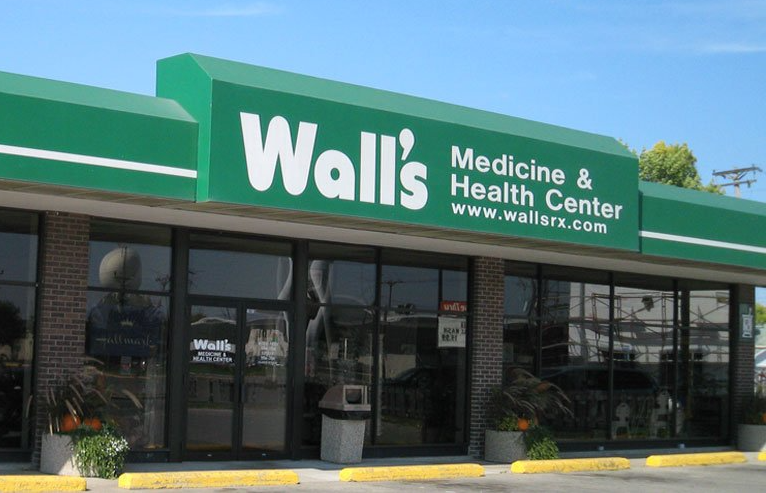grand forks nd pharmacy called walls medicine center and this photo is showing the storefront on washington st in gf