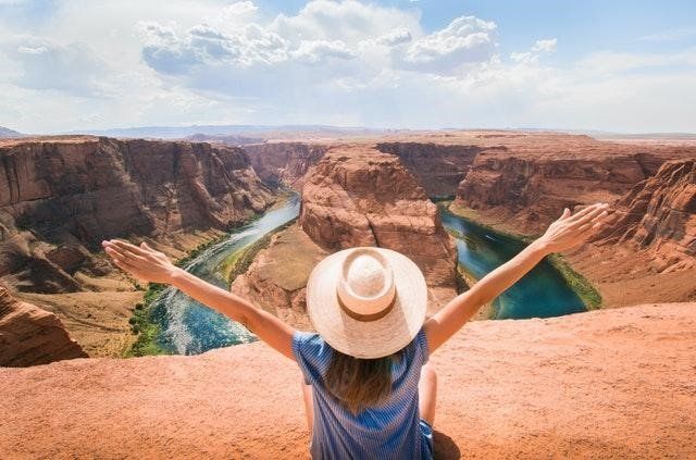 Happy Woman With A Mountain