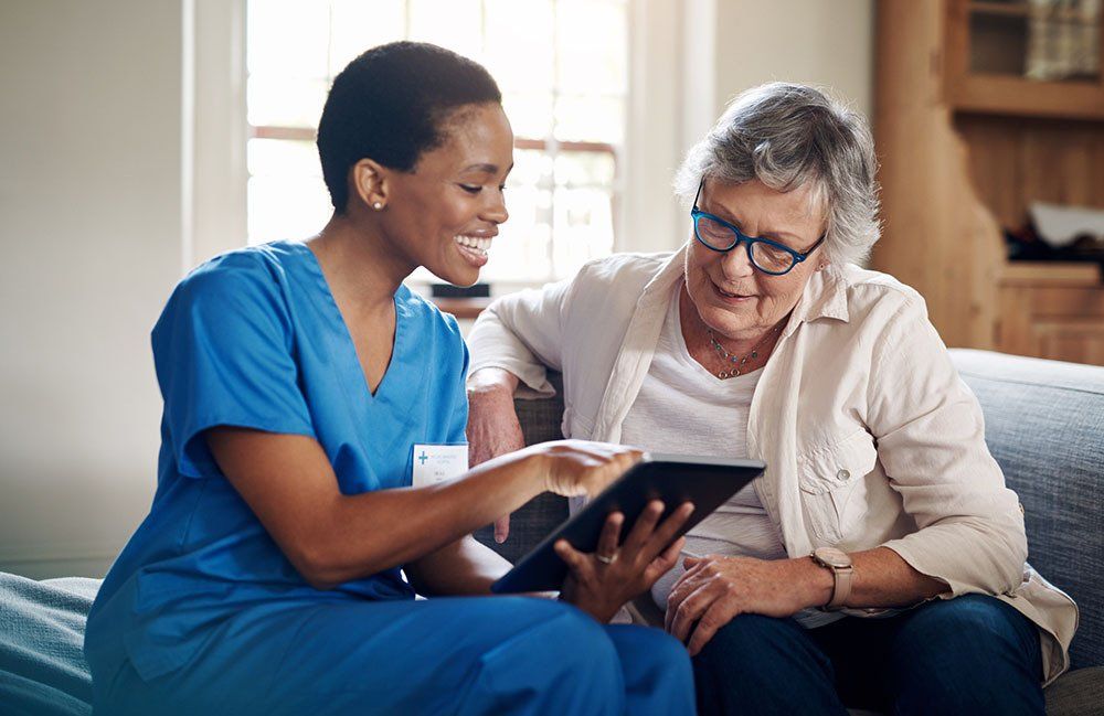 Showing X-Ray Result Through Tablet — Metairie, LA — Xpress Ray Inc. Showing X-Ray Result Through Tablet — Metairie, LA — Xpress Ray Inc.