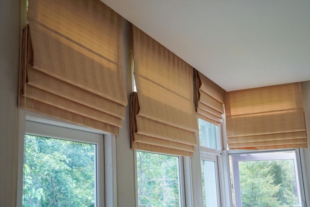 Brown Roman Blind — Window Furnishing Services in Burleigh Heads, NSW