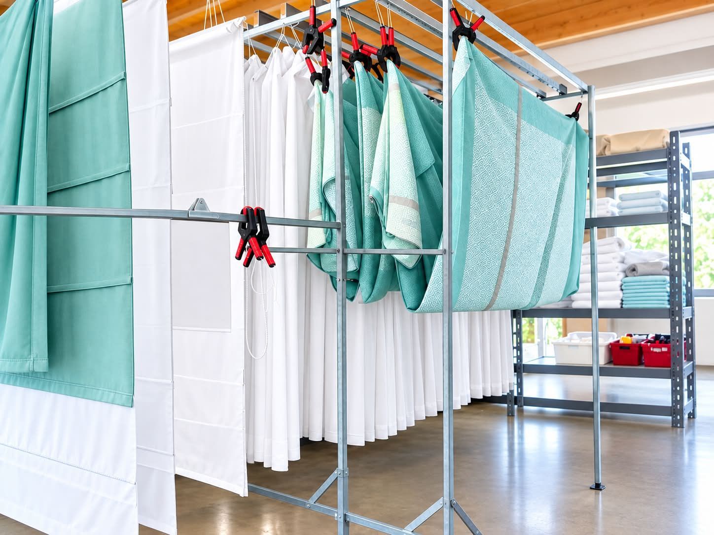 Turquoise Curtains Drying in a Workshop — Window Furnishing Services in Tweed Heads, NSW