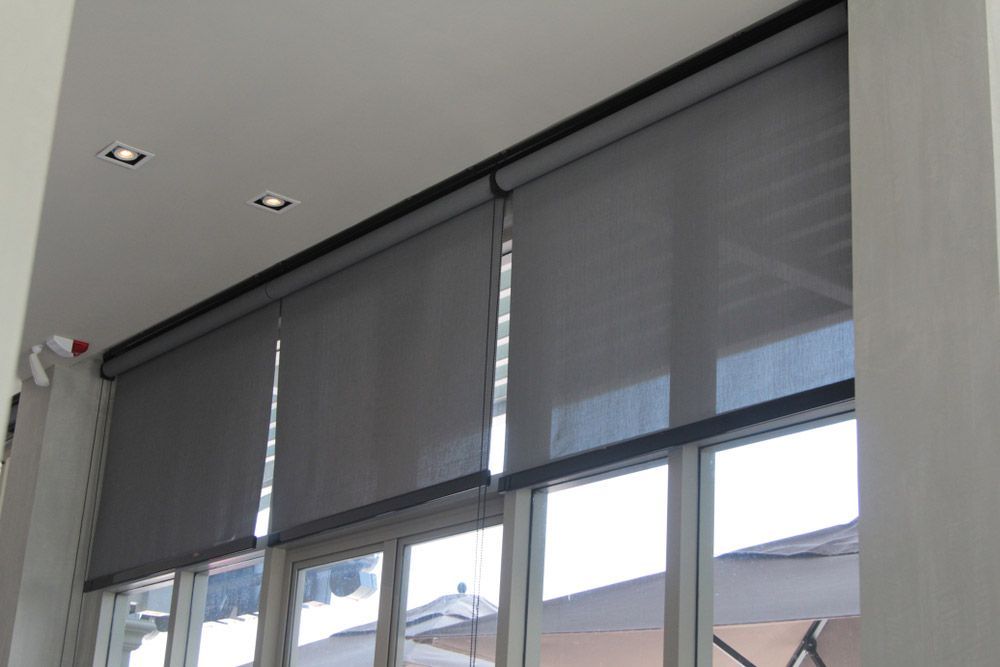 Roller Blinds or Curtains at The Glass Window — Window Furnishing Services in Tallebudgera, NSW