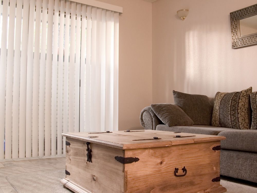 White Vertical Blinds After Cleaning — Window Furnishing Services in Byron Bay, NSW