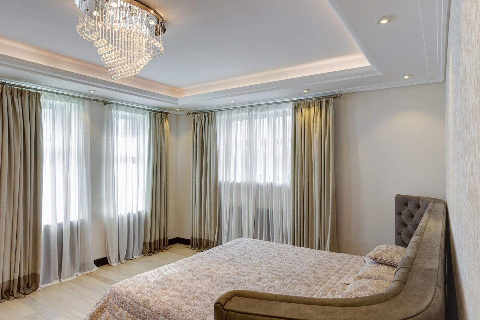 Hanging up curtain using pleat hooks — Curtain Cleaning in Tweed Heads, NSW