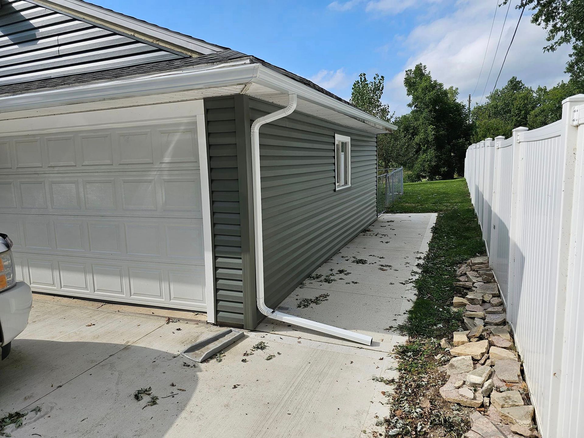 House Gutter With Downspout