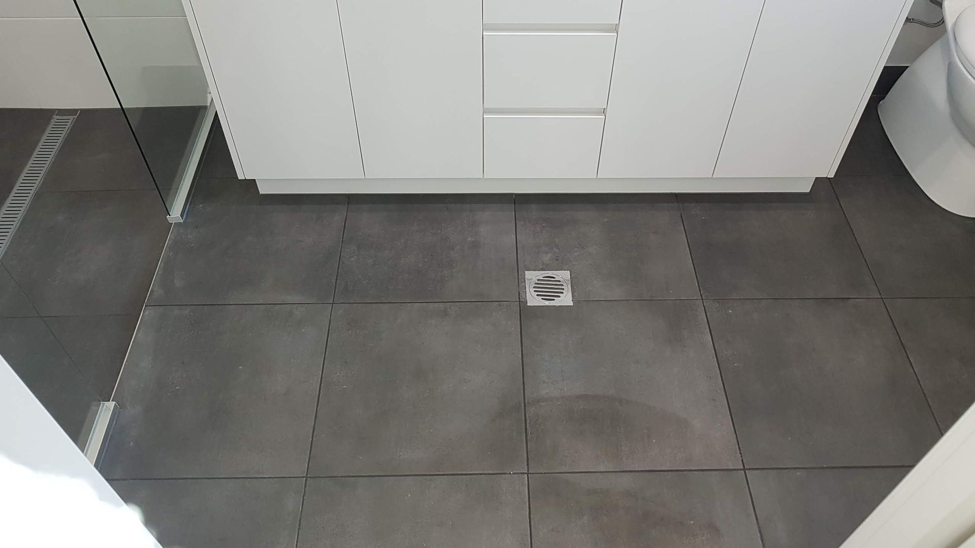 bathroom floor cleaning — Kristal Kleen Services in Proserpine, QLD