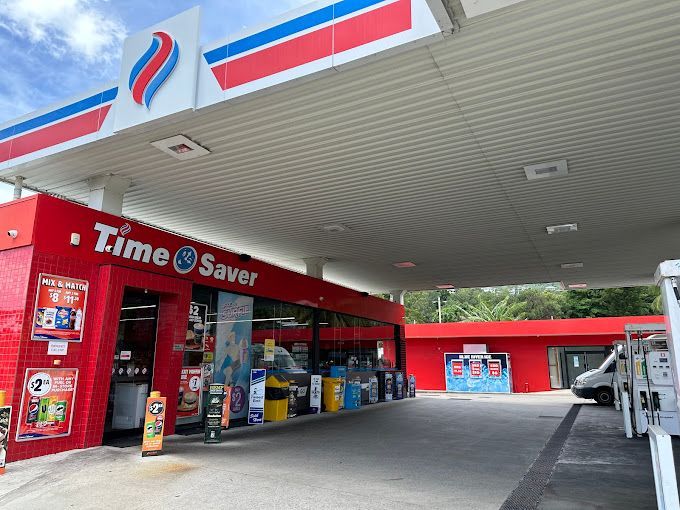Woman Collecting Trash in the Bag — Kristal Kleen Services in Jubilee Pocket, QLD