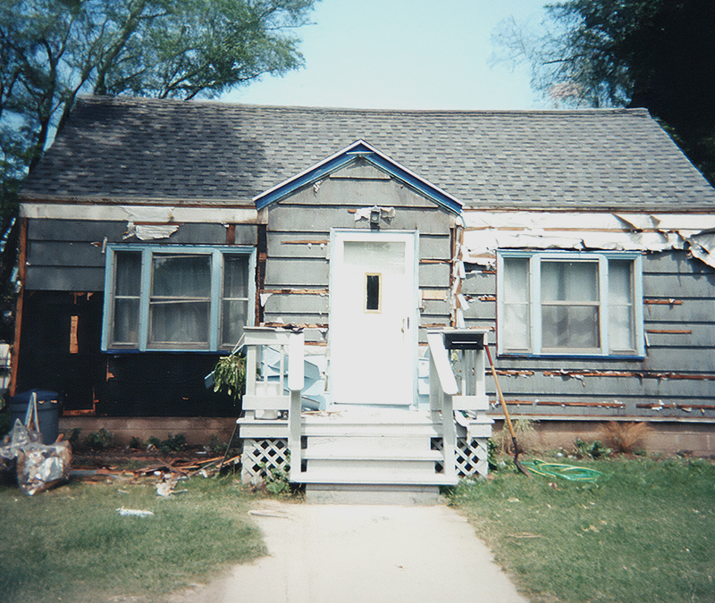 Photo of a distressed property we purchased, rehabbed, and sold as a fix and flip.
