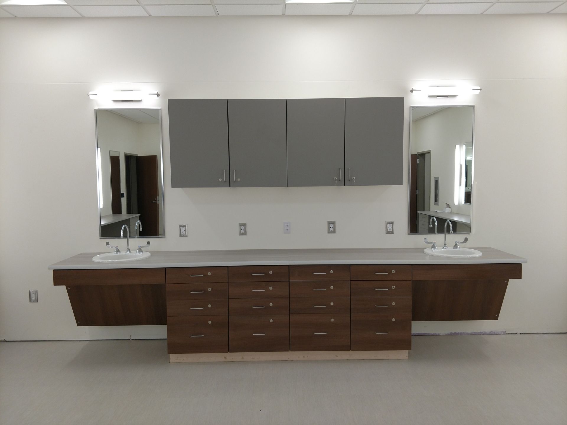 Commercial Casework Modern Bathroom Counter Solid Surface  Cabinet Hutchison Brothers Cabinetry Russellville AR