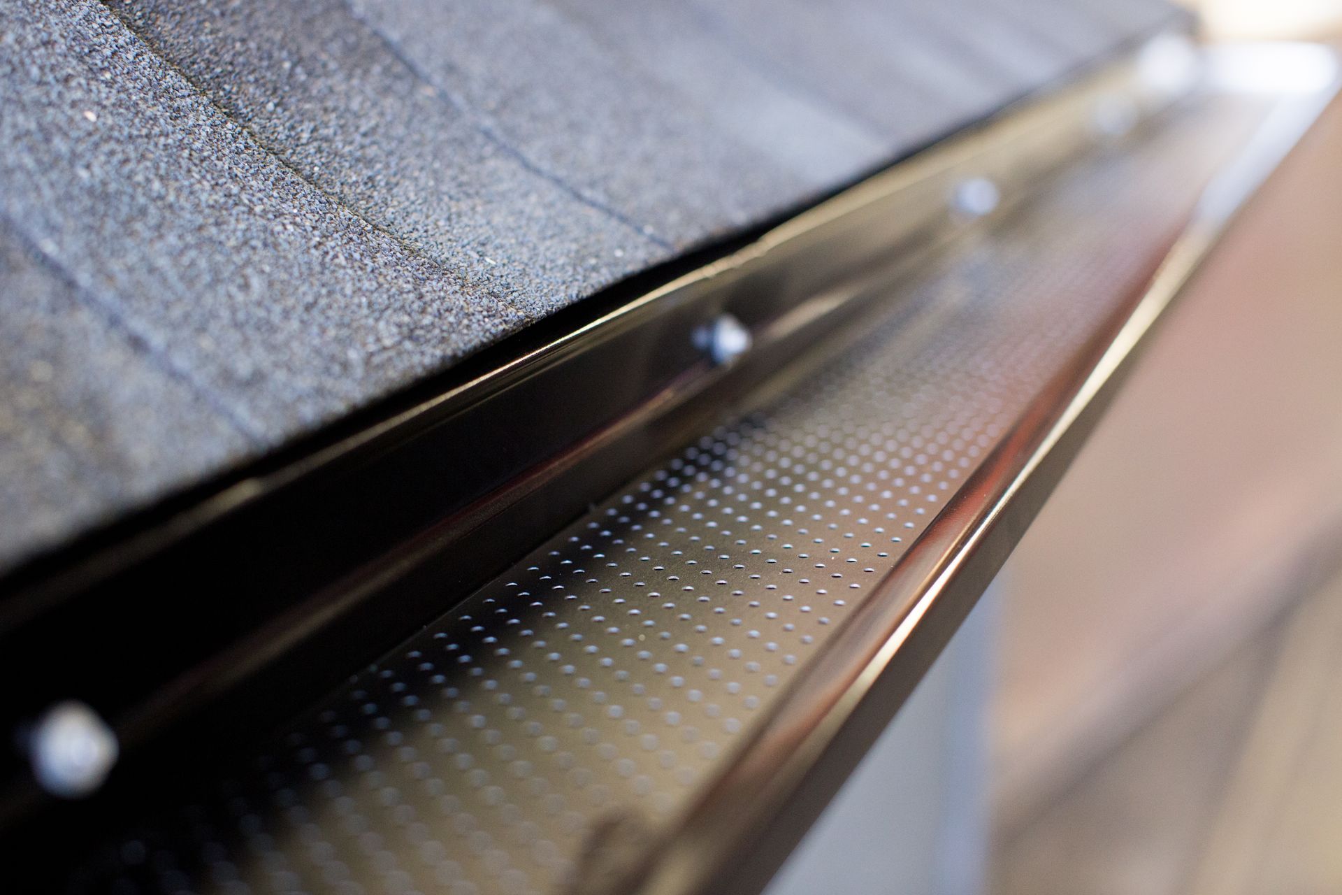 Close-up image of a black gutter