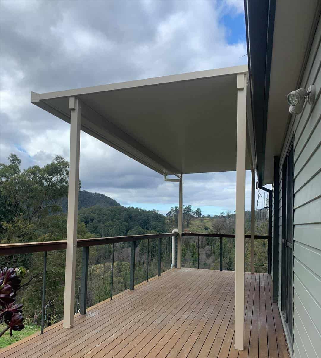 A Large Wooden Deck With A Canopy Over It — Caprice Home Additions In Forster, NSW