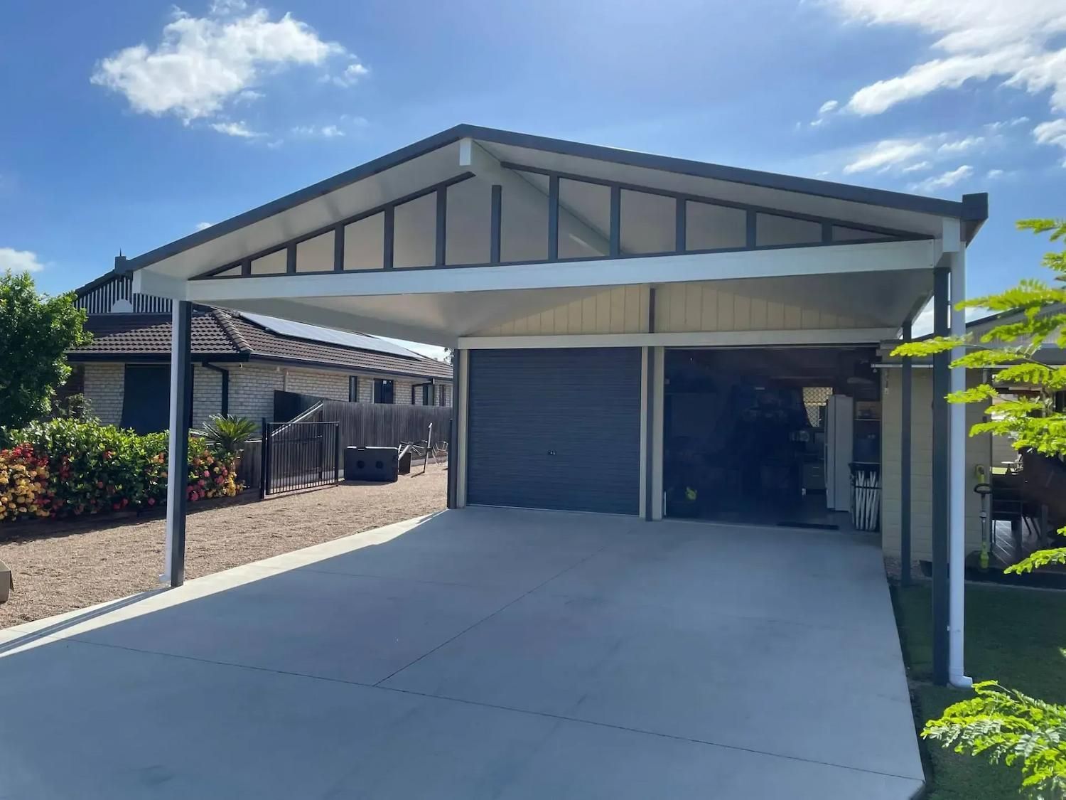 Carport Benefits Shown With Modern Covered Driveway Beside Garage