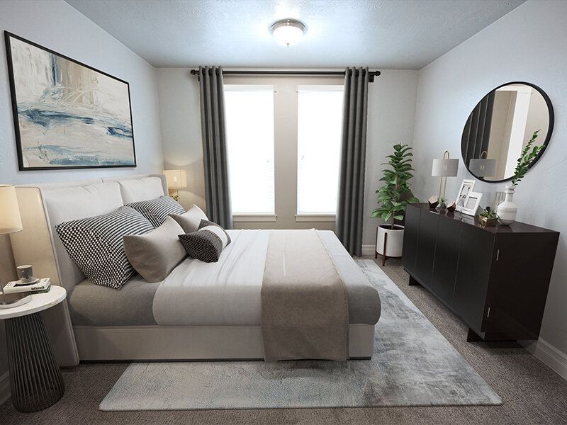 Hills at Renaissance Bedroom with bed, dresser, window, and abstract artwork in neutral tones.