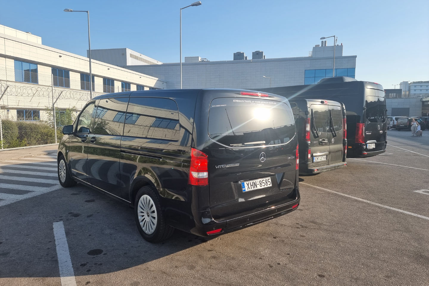Athenaos Travel Mercedes vans parked at Athens International Airport
