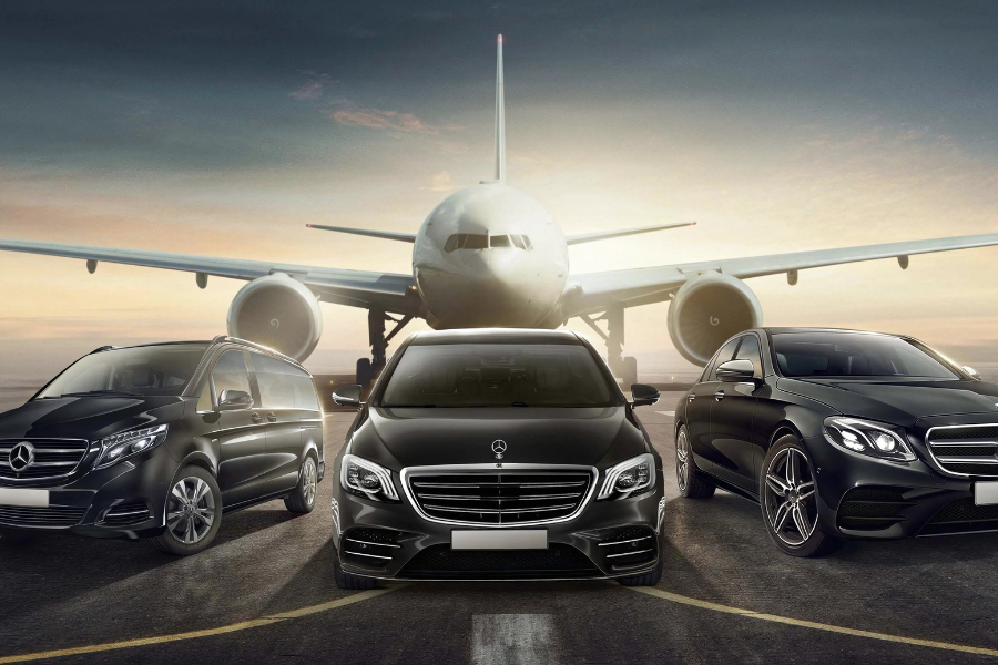 Athenaos Travel & Tours Mercedes vehicles at Athens International Airport offering airport transfer services.