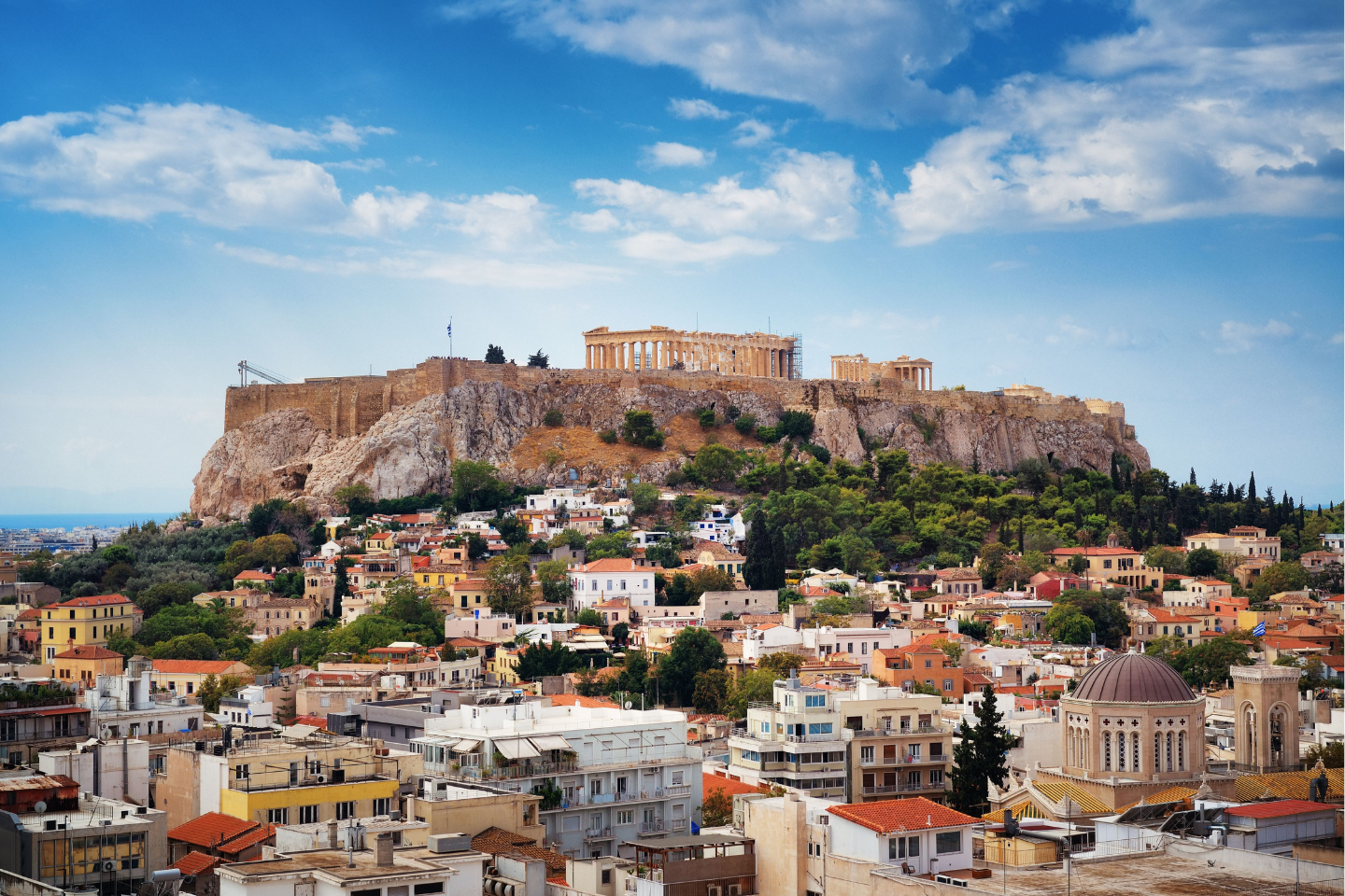 Panoramic view of the Acropolis above Plaka and Monastiraki Square in Athens, featured in the guide
