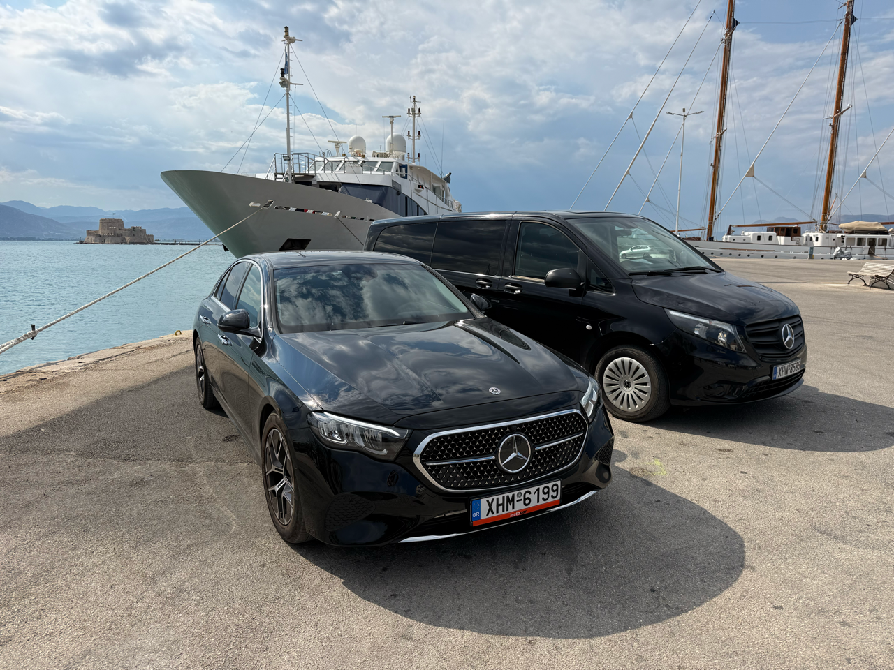 Athenaos Travel & Tours premium Mercedes E-Class and Minivan at Nafplio ready for transfer and tour service.