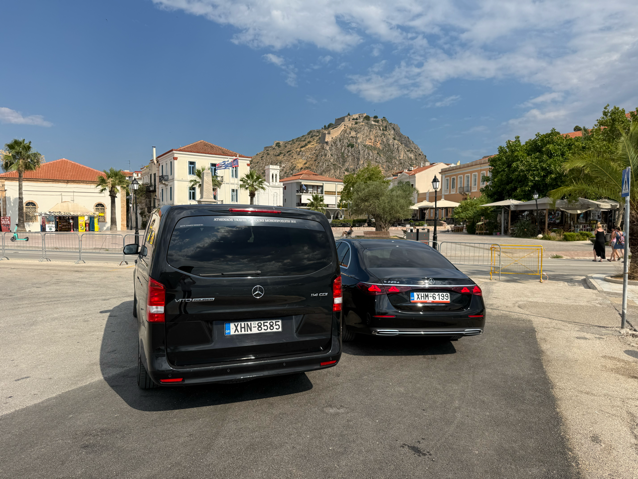 Athenaos Travel & Tours premium Mercedes E-Class and Minivan at Nafplio ready for transfer and tour service.