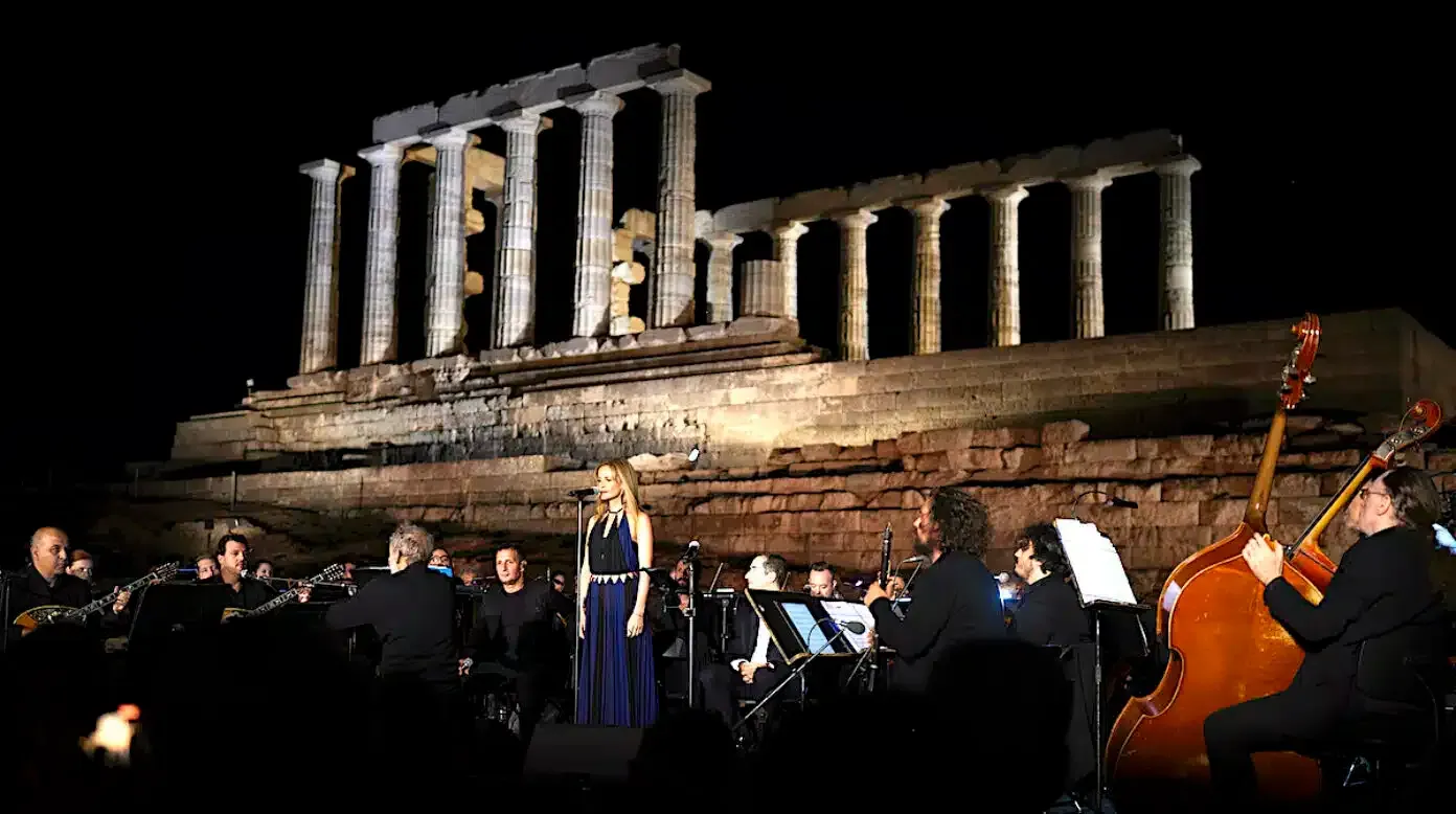 Live music performance at the Temple of Poseidon during the illumination event at Cape Sounion, Greece.