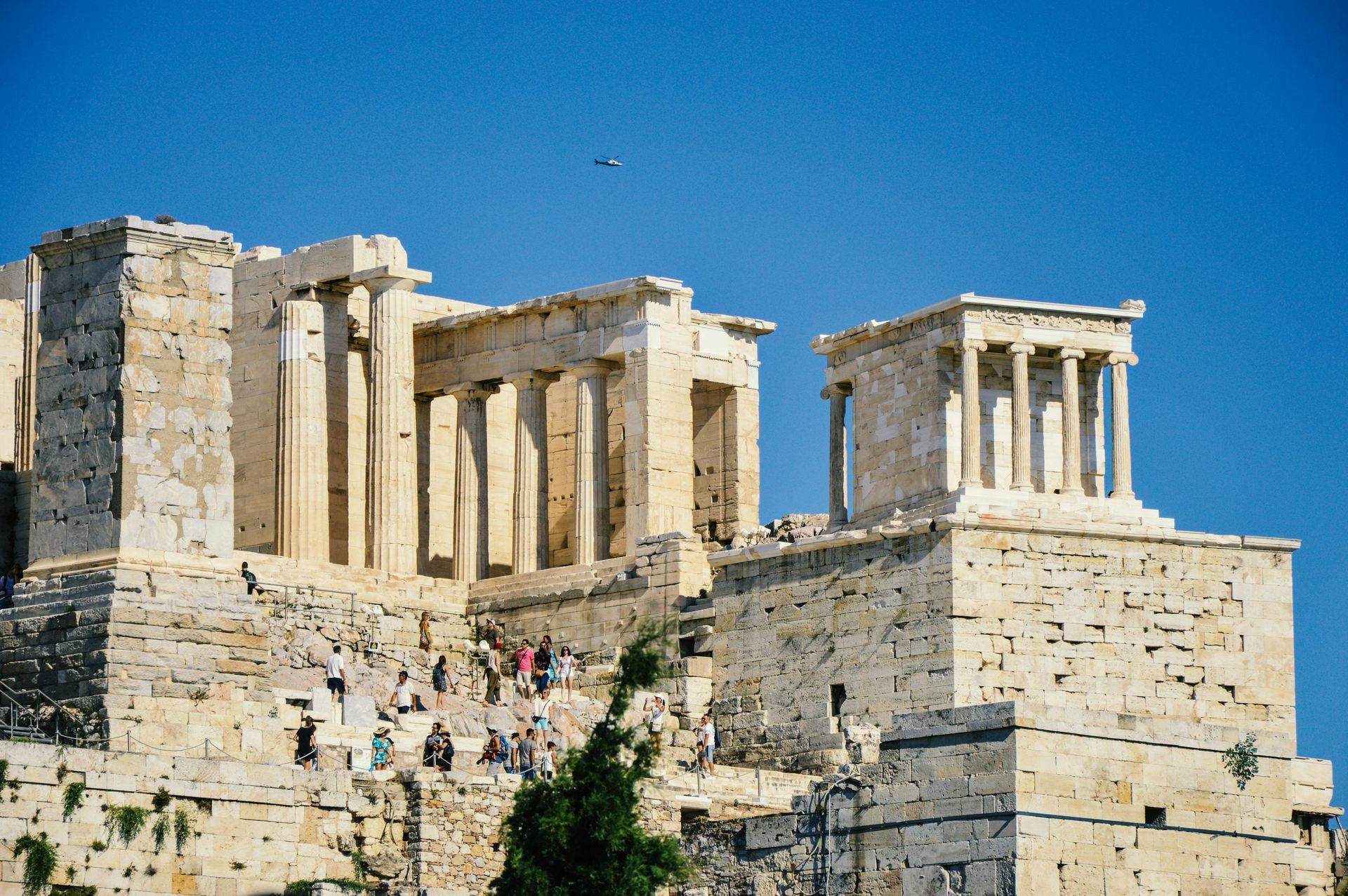Visitors at the Propylaea entrance of the Acropolis in Athens during free admission day to archaeological sites in Greece.