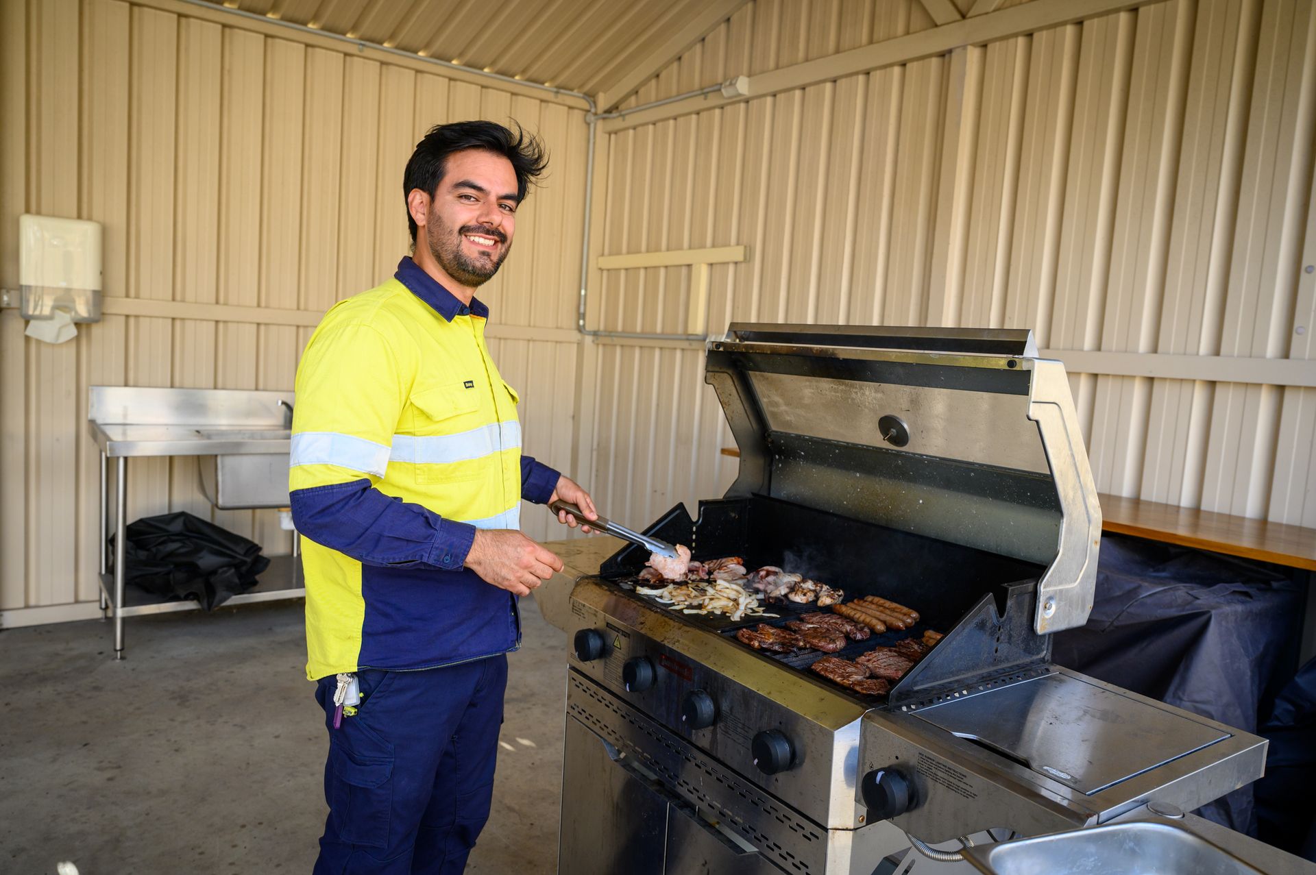 FIFO worker cooking a BBQ