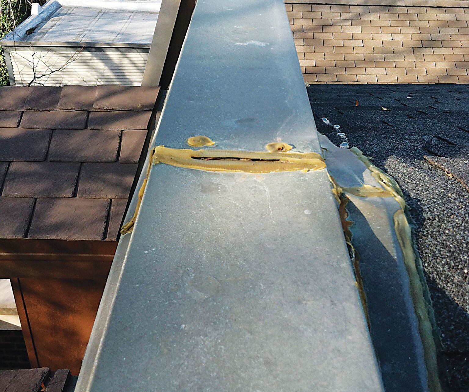 Metal Coping with failed caulk on seam, Lakeview, Chicago
