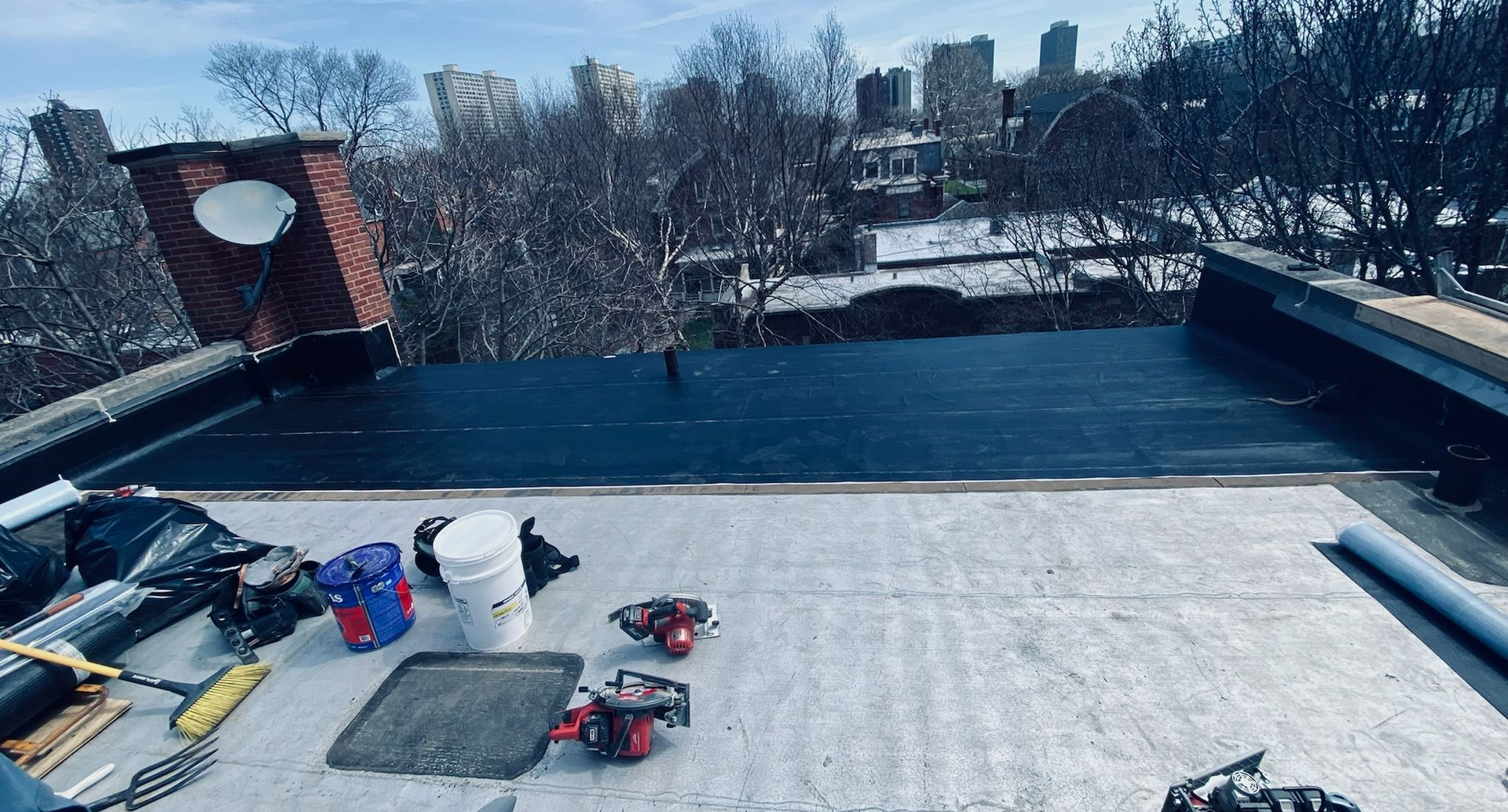 Rooftop work area with tools