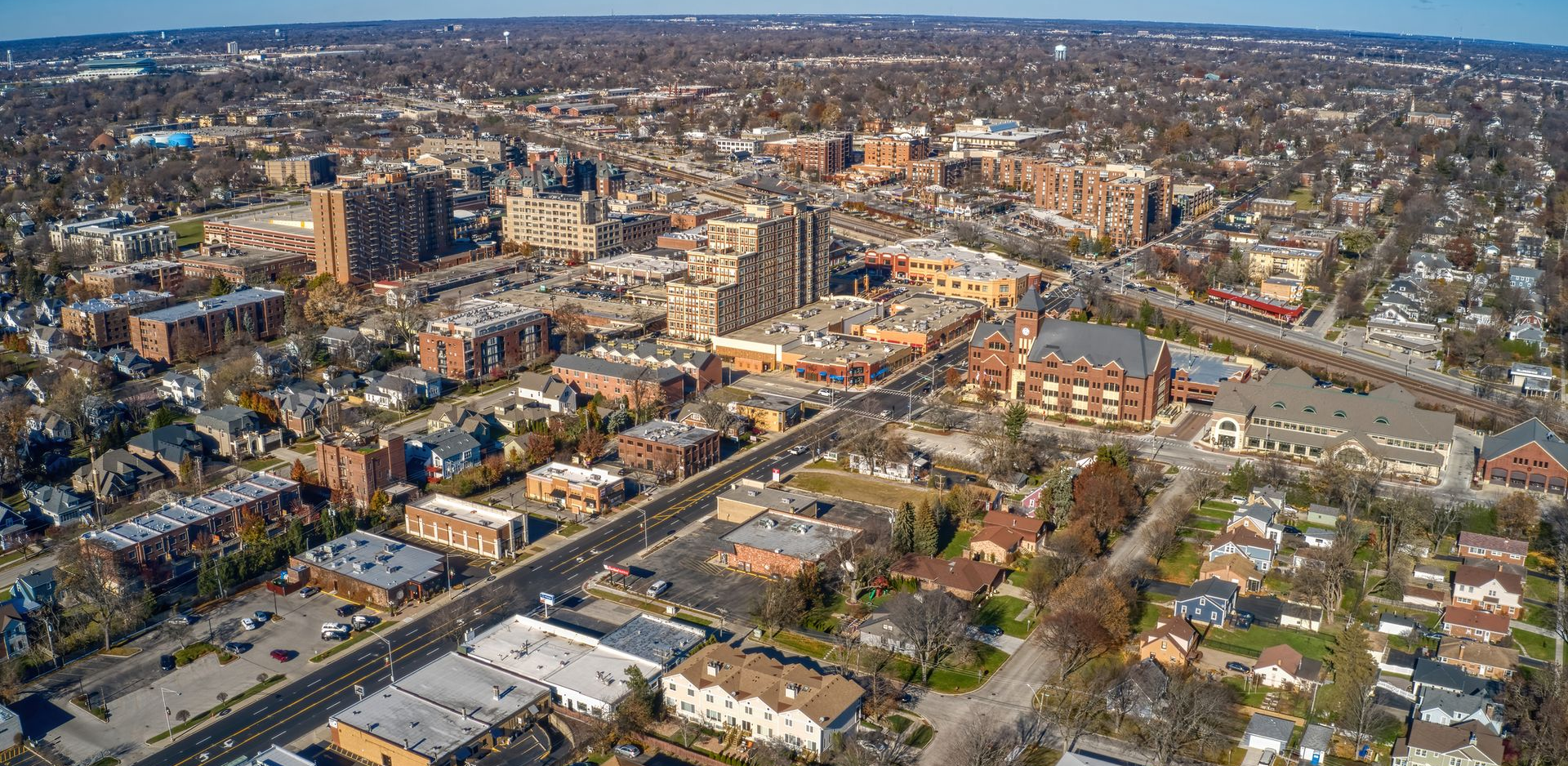 Aerial view of a dense city(Arlington Heights) with streets and buildings