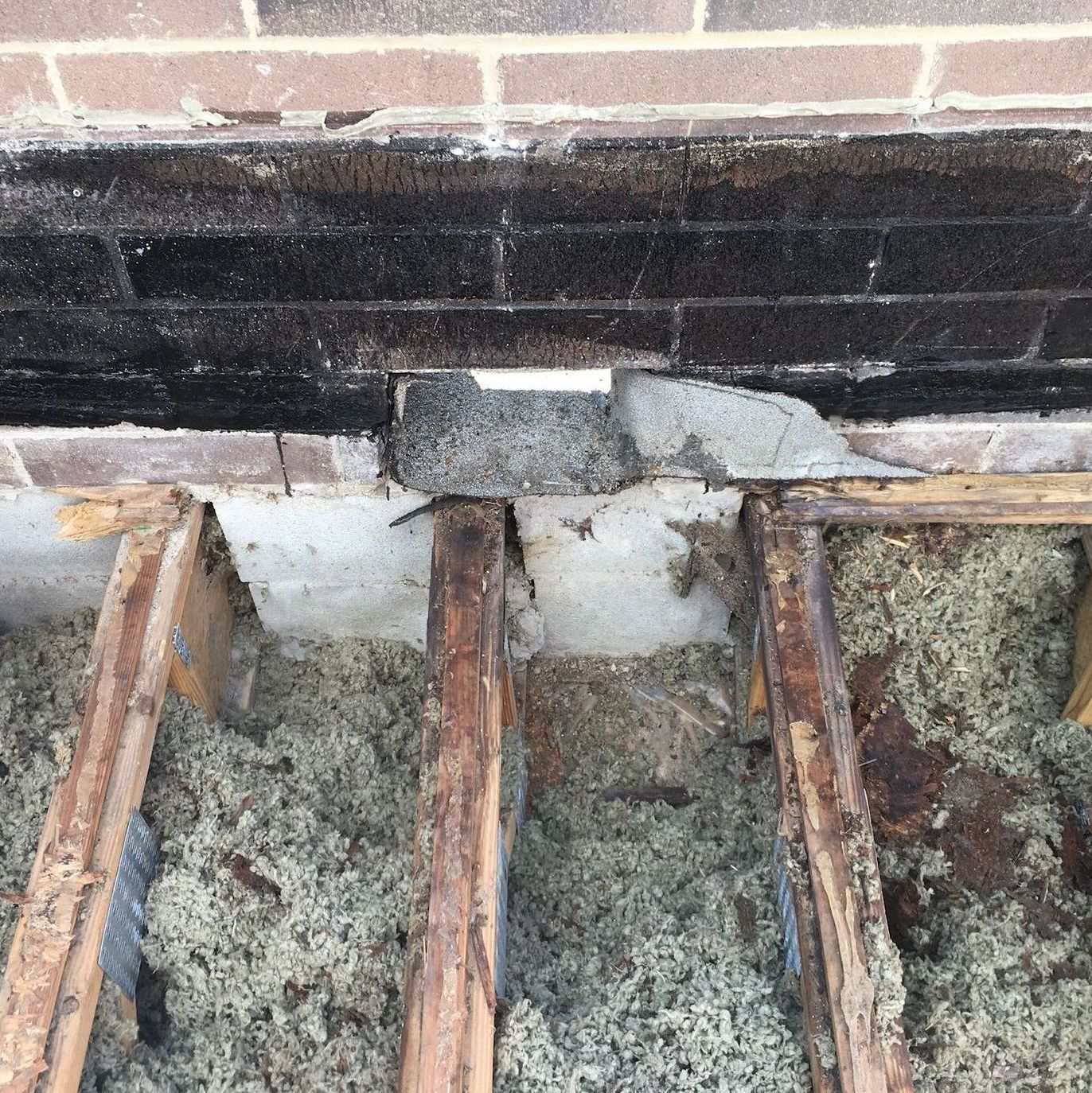 Rotting truss beneath scupper