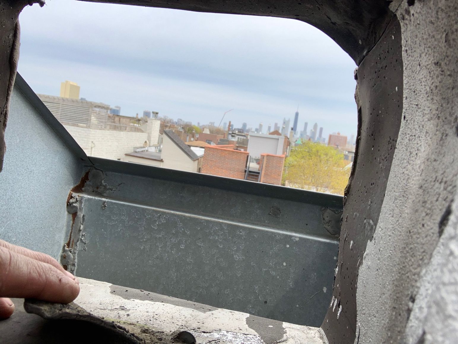 Chicago skyline in distance through scupper box