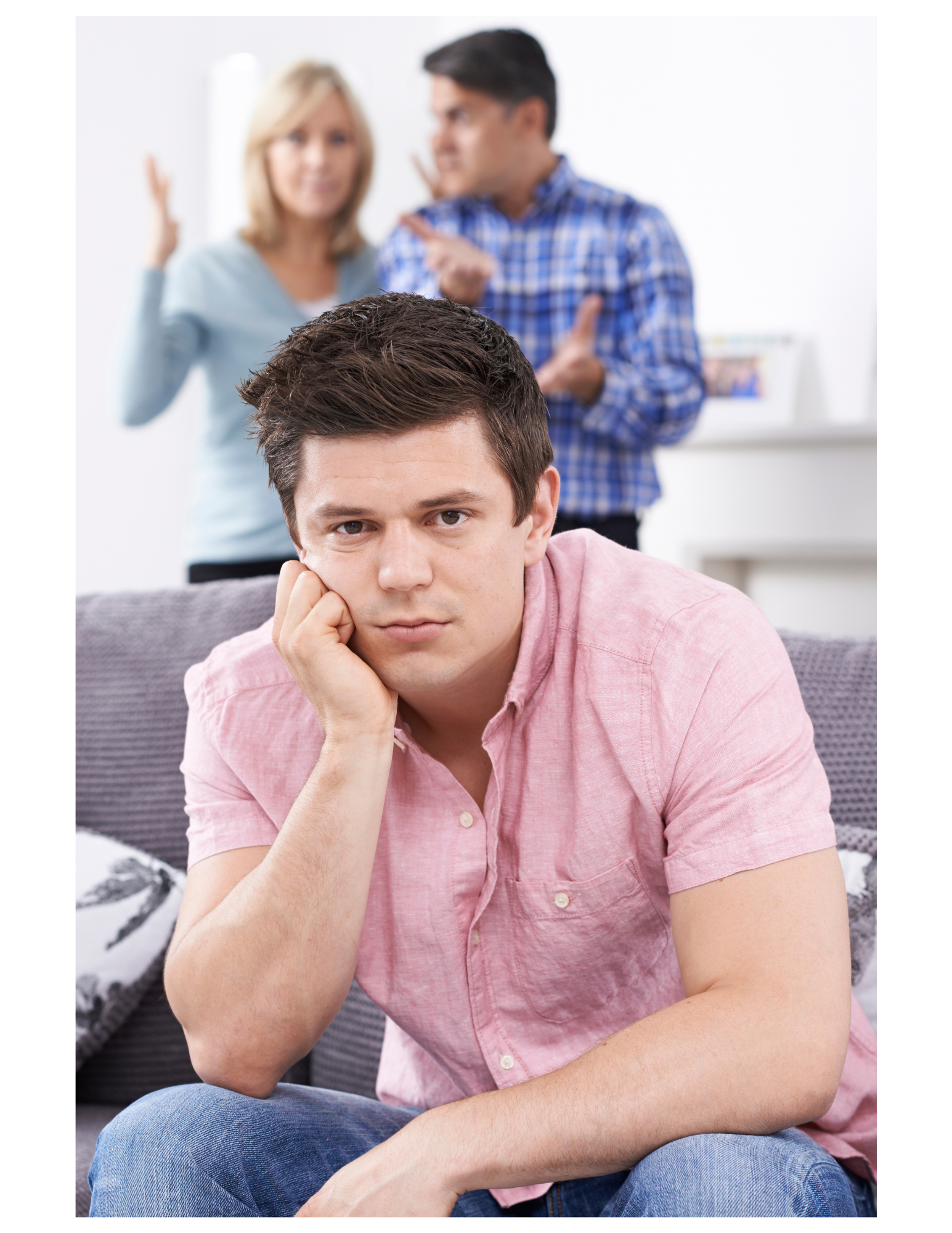 Man sits looking sad as couple behind him argue.