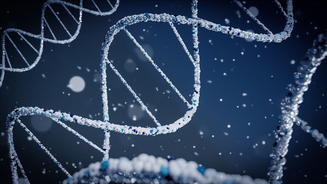 DNA double helix, blue and white, with a dark blue background.