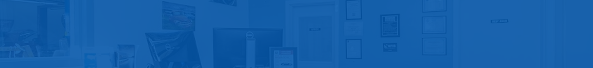 Blue-toned abstract tech background with a faint world map and digital interface icons | Pro-Tech Autoworks