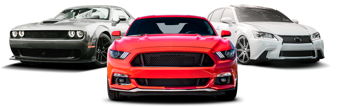 Three sports cars front-facing, with a red car centered between a gray car and a white car. | Pro-Tech Autoworks