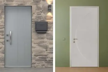 Due porte d'ingresso: una porta grigia con muro in pietra e cassetta delle lettere, e una porta bianca su muro verde.