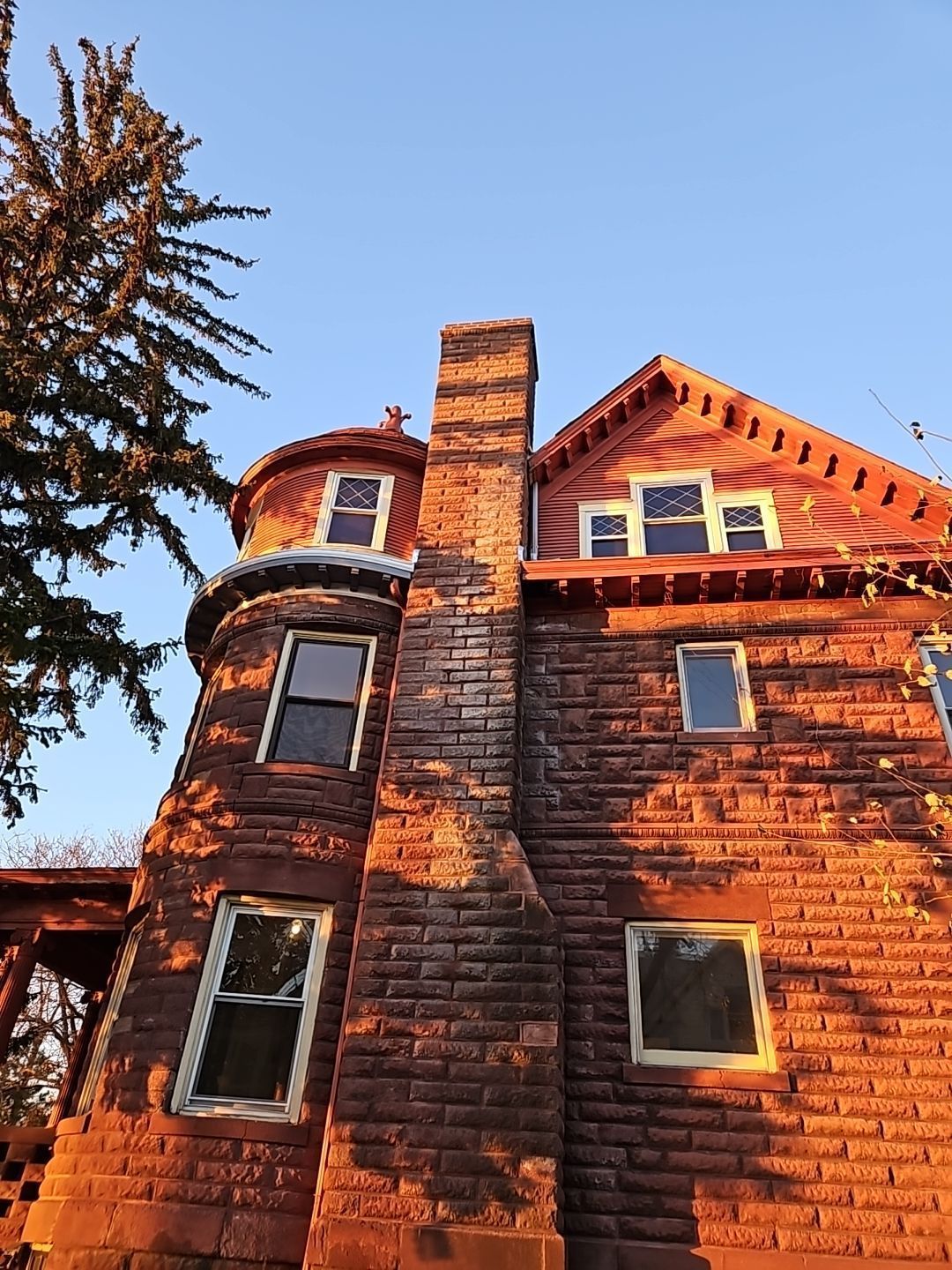there are two skylights on the roof of a house .