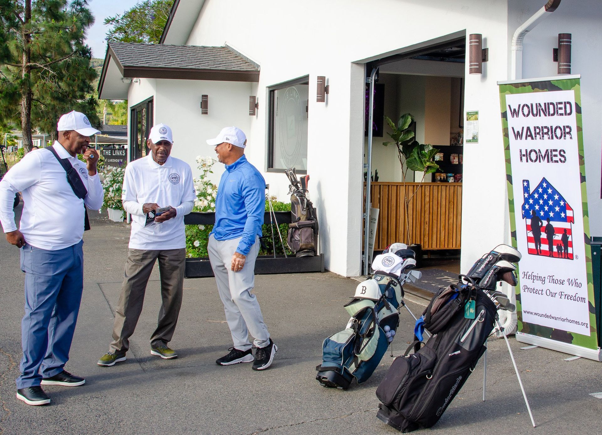 Golfers at Wounded Warrior Homes golf fundraiser