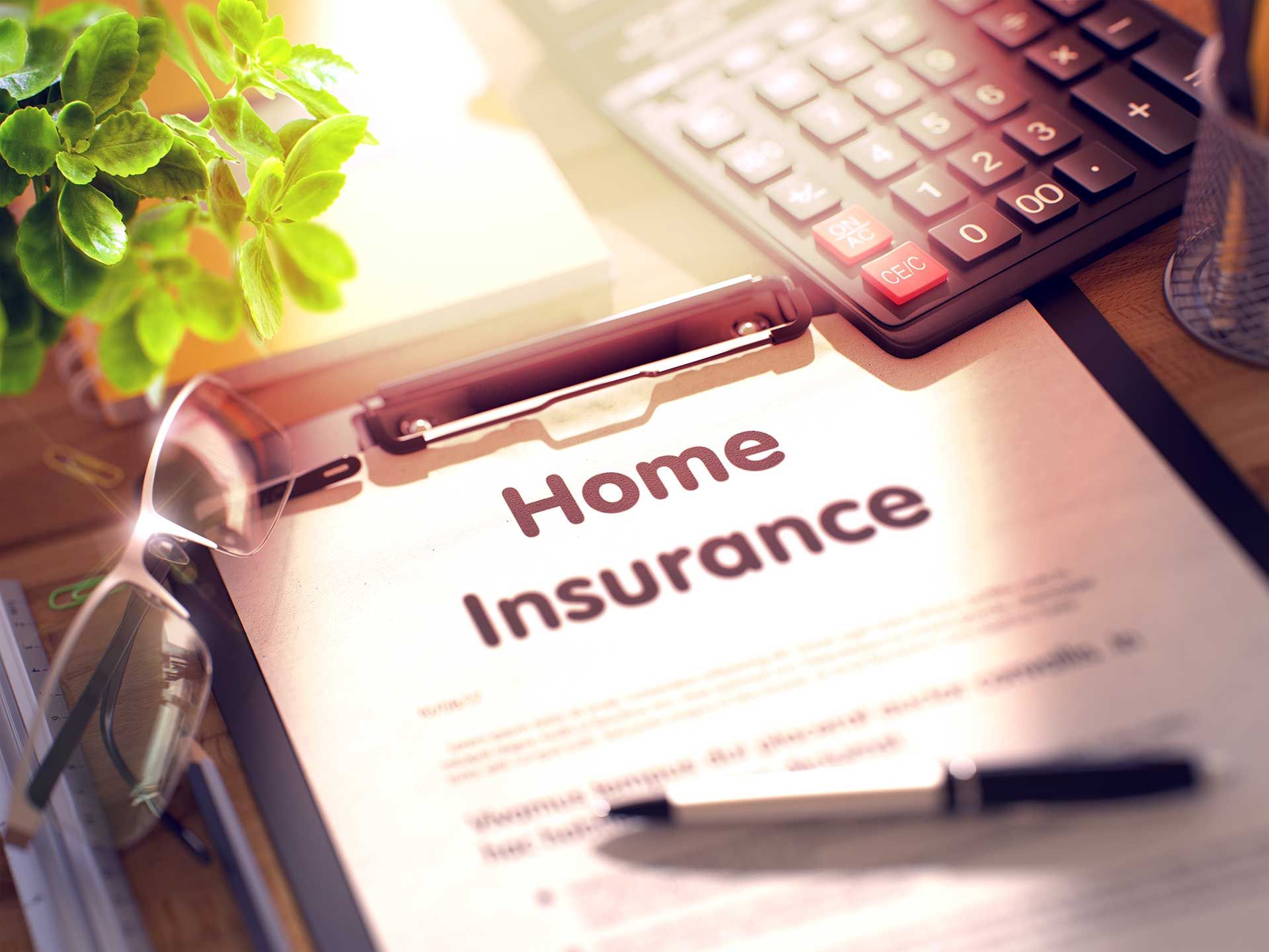 Home Insurance Concept on Clipboard