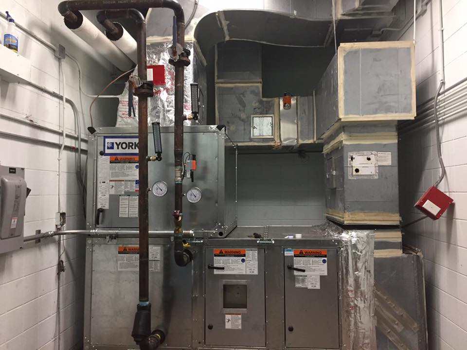 Technician Is Checking Air Conditioner — Winter Haven, FL — Gibson Air Conditioning