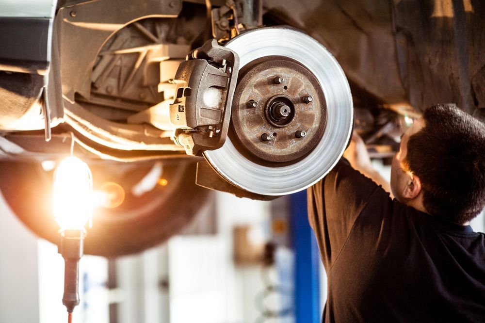 Car Hanging on the Lift — Mechanics in Ballarat