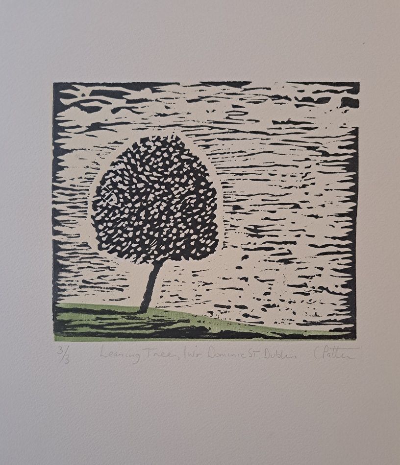 Leaning Tree, a linocut by Caroline Patten, part of the 2026 Bloomsday / Summer group show at the Olivier Cornet Gallery, Dublin