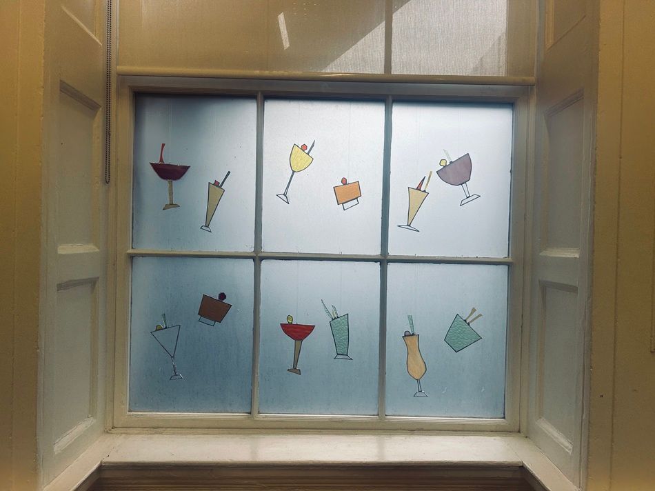 Cocktails in the Sky, a series of cut stained-glass and mirror works by Kelly Ratchford, part of the Olivier Cornet Gallery's 2025 Bloomsday / Summer group exhibition Out of Lines