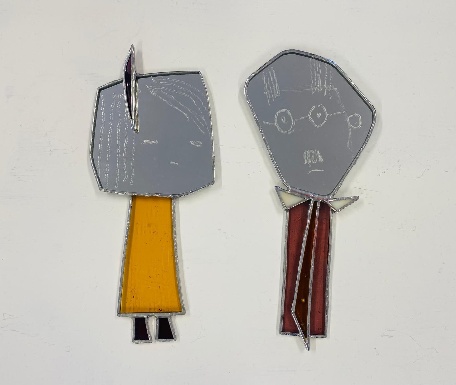 Simple Minded Jim and His Dirty Little Fuckbird Nora, two pieces in stained glass by Kelly Ratchford, part of part of the 2026 Bloomsday / Summer group show at the Olivier Cornet Gallery, Dublin