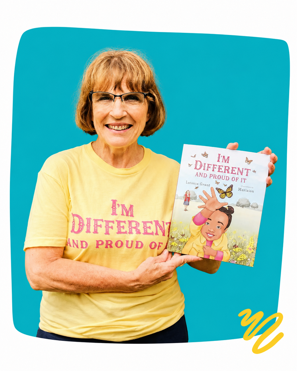Smiling woman in yellow shirt holding a children’s book against a teal background