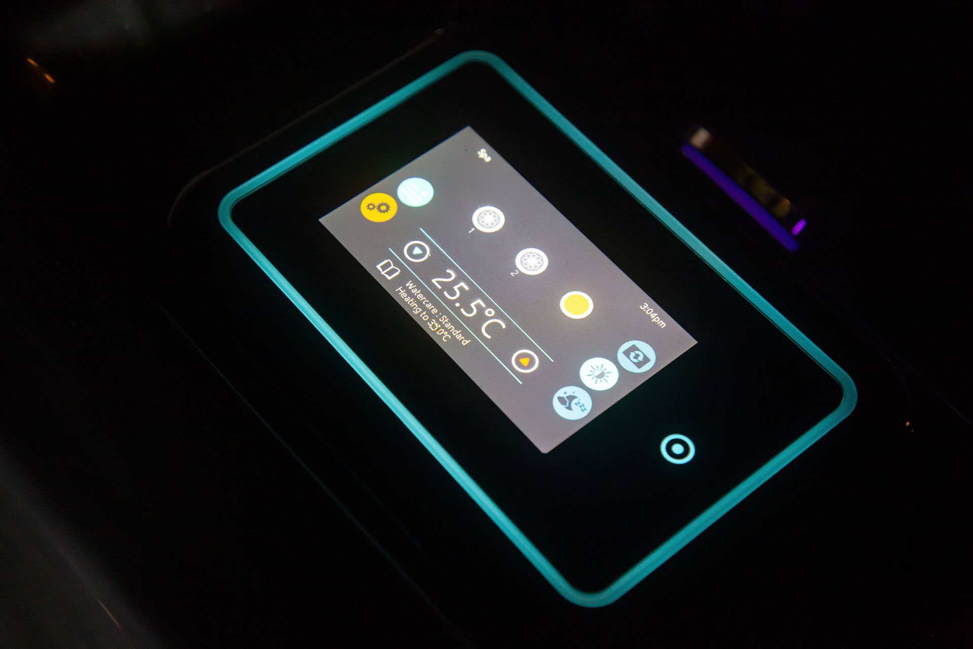Glowing smartphone screen with app icons on a dark background