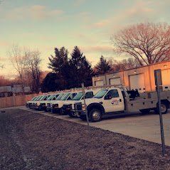 Row of Work Trucks - Roto-Rooter Sewer & Drain Cleaning in Waterloo, IA