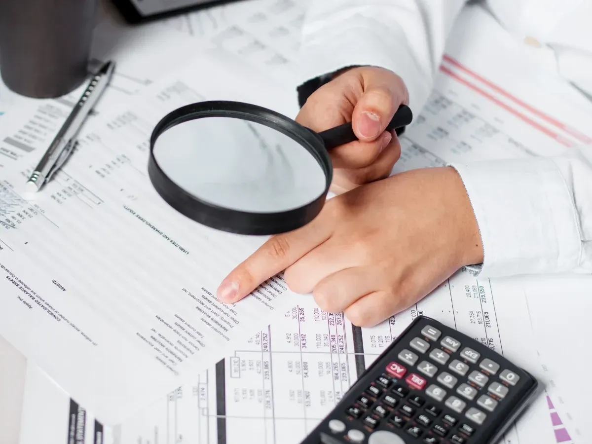 an insurance agent having trouble looking at statements
