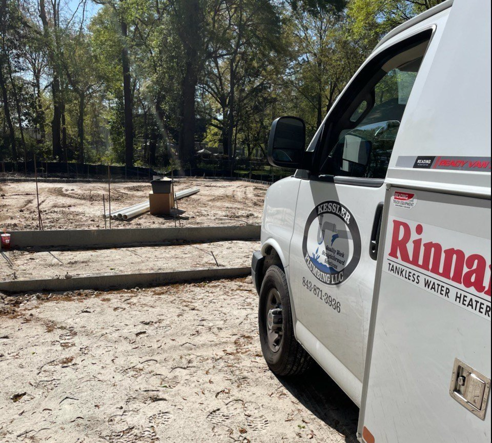 A work van parked at a construction site.
