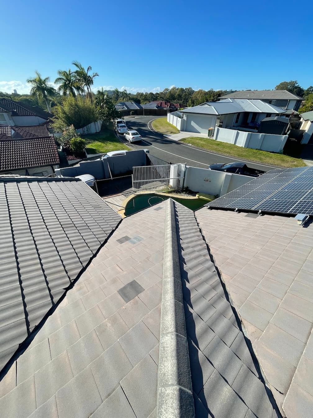 the roof of a house has solar panels on it